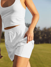 white skort with drawstring at waist and short detail underneath